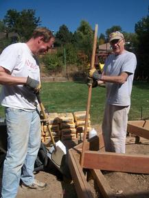 Filling the sonutubes with concrete.