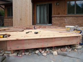 View of drip-edge cut in under-side of outer deck board