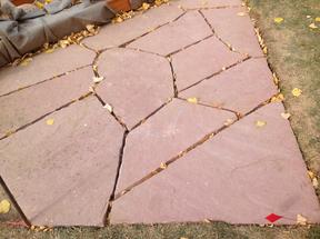 Flagstone patio before filling the cracks.
