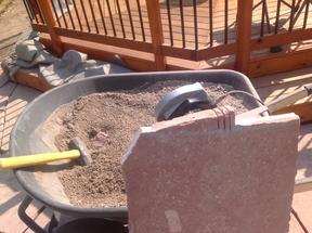 Cutting out a notch from flagstone.