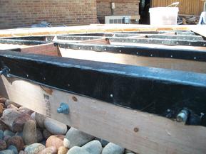 View of ice-and-water wrapping tops of joists