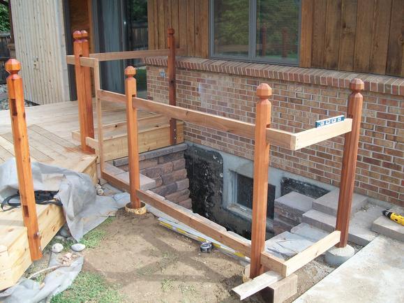 View of rail posts suspended in proper positions by railings.