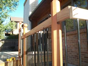 View of top rail sliding down over balusters.